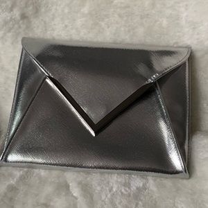 NWT La Prairie hand clutch bag.